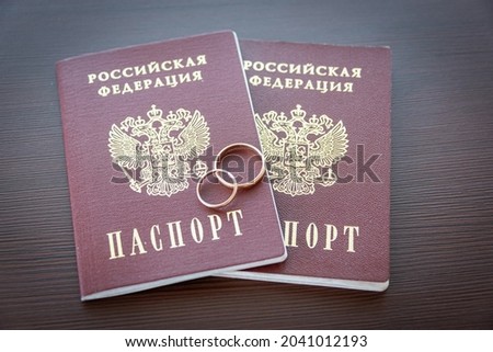 Russian passports and gold rings.
