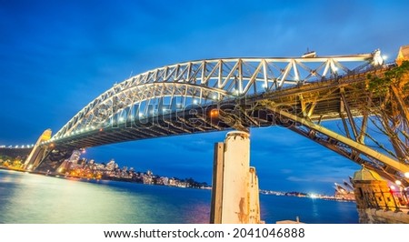 Sydney Harbour Bridge and city night skyline, Australia.