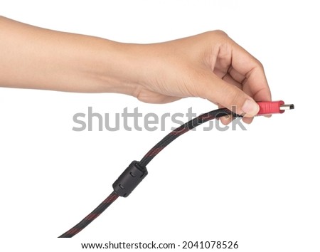 Hand holding High Speed HDMI Cable isolated on white background
