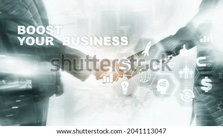 Financial and Technology concept. On a virtual screen inscription: Boost Your Business.