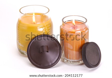 Assortment of decorative scented candles shot on a white background. Royalty-Free Stock Photo #204112177