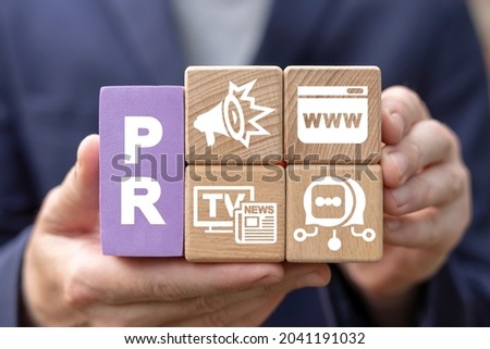 Concept of PR Public Relations. Marketing campaign. Announcements through mass media to advertise your business. Management and marketing strategy. Royalty-Free Stock Photo #2041191032