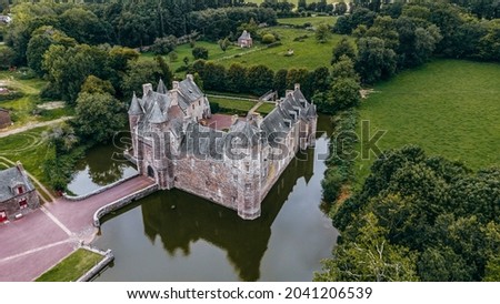 Aerial view of the castle located in La forêt (forest) of Brocéliande, in Brittany, France Royalty-Free Stock Photo #2041206539