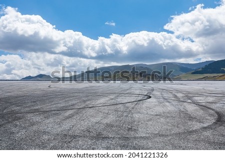 Road ground and mountain natural scenery under blue sky.Landscape and road.Outdoor road background.