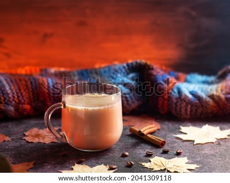 Hot autumn spicy coffee with milk. Alcoholic with the addition of whiskey or a non-alcoholic cocktail, copy space