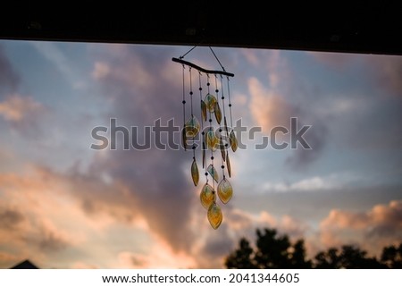 Wind Chimes at Sunset in Ohio Royalty-Free Stock Photo #2041344605