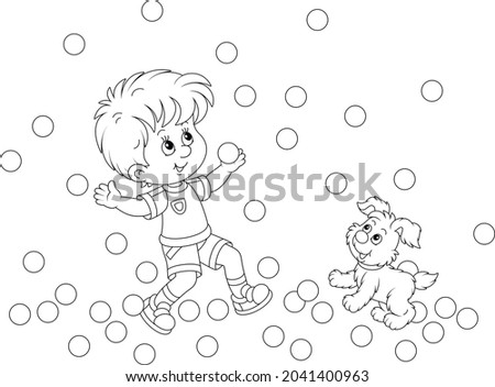 Happy little boy and his cute merry pup playing with small jumping balls on a playground, black and white outline vector cartoon illustration for a coloring book page