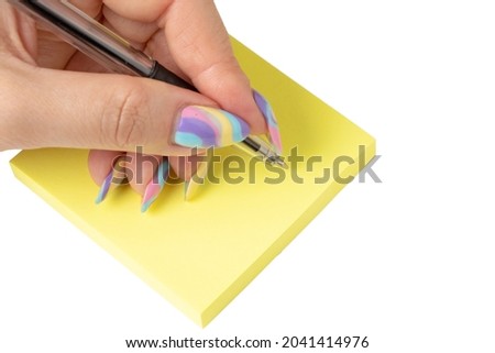Hands with pen over paper isolated on white background.