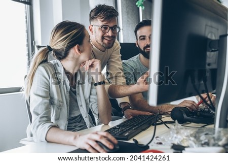 Group of programmers and software developers working on a new project at the office.	 Royalty-Free Stock Photo #2041424261