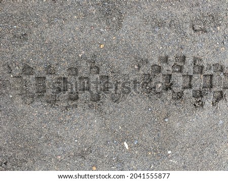 Motocross tire tread on the sand