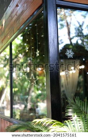 Blurred coffee shop or cafe restaurant with abstract bokeh light photo background.