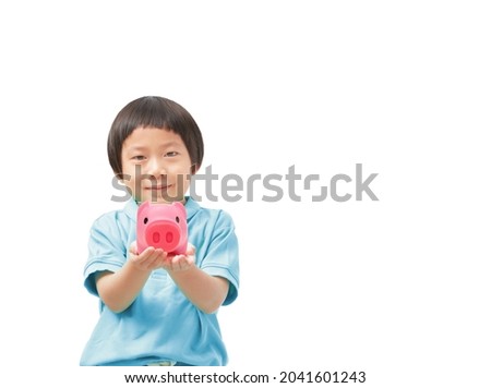 Saving Money Idea for Safe Fund and Future Invesment Concept, Asian boy holding Pink piggy bank in his hands on white background