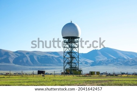 Meteo weather surveillance radar looks like air defense radar tower station in the form of a ball Royalty-Free Stock Photo #2041642457