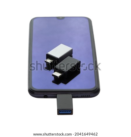 Phone Isolated on a white background data transfer via a universal USB flash drive adapter.