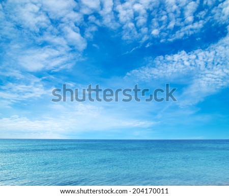 sea beach blue sky  Royalty-Free Stock Photo #204170011