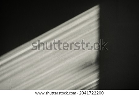 Abstract background and texture. Graphic geometric shadows on the wall