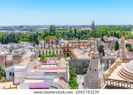 Aerial view of Sevilla from la giralda tower with Real Alcazar and Plaza de Espana, Spain