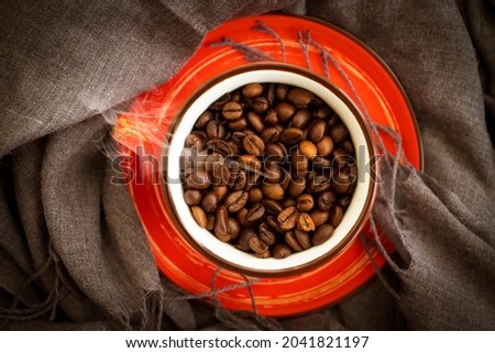  cup, coffee bean, cloth background