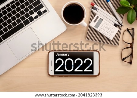 January 2022.Calendar on mobile phone for Planner and organizer to plan and reminder daily appointment, meeting agenda, schedule, timetable and management of job, Work from home. 