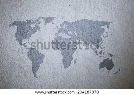 world map on grey cement texture