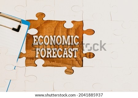 Inspiration showing sign Economic Forecast. Concept meaning attempting to predict the future condition of the economy Building An Unfinished White Jigsaw Pattern Puzzle With Missing Last Piece