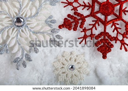 Snowflakes in the snow. Christmas background.