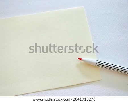 Paper design with red color pen on white background and Blank for Copy space.