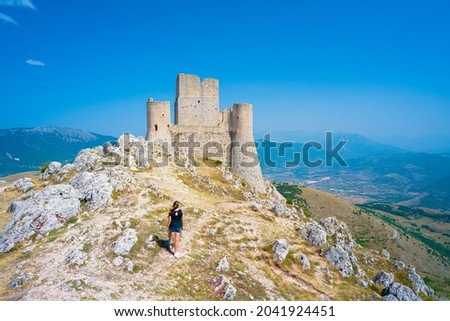 Castle of Rocca Calascio and Santa Maria della Pieta church, Aquila, Abruzzo, Italy. Part of Gran Sasso National Park, location for several film scenes, one of 15 most beautiful castle in the world Royalty-Free Stock Photo #2041924451