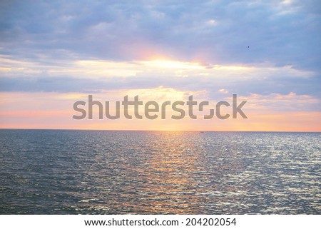 Sunset unser the sea
