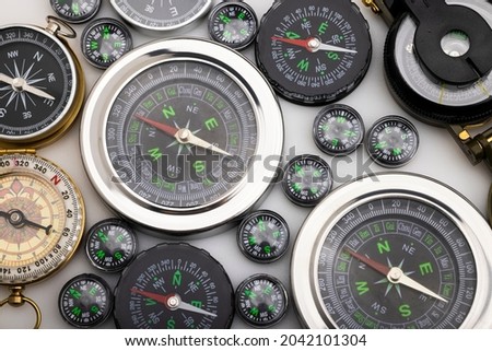 Many navigation compass on white background 
