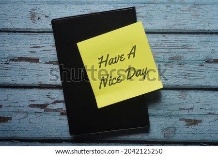 Top view of notes with Have A Nice Day wording