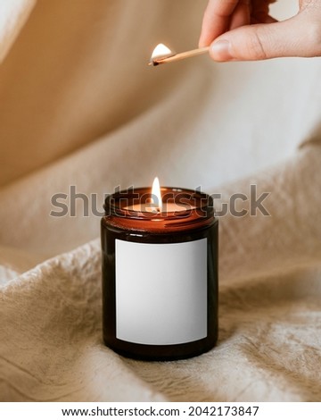 Lighting aroma scented candle home decor Royalty-Free Stock Photo #2042173847