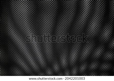 Chaotic overlap of polypropylene meshes. Graphic illusion, abstract black background. CD cover design, album, website, social media profile. Chaos, angle of view. Science fiction technology.  Royalty-Free Stock Photo #2042201003