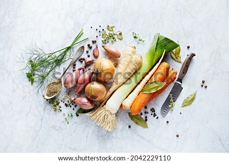 Vegetables, herbs and spices for healthy vegan stock. Flat lay