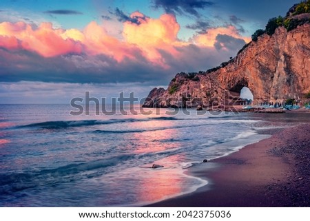 Dramatic summer scene of Palinuro. Picturesque morning view of Natural Arch of Palinuro, Italy, Europe. Fantastic sunrise on Mediterranean sea. Beauty of nature concept background.
 Royalty-Free Stock Photo #2042375036