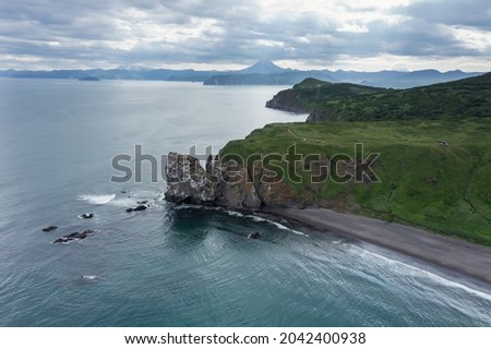 Khalaktyrsky beach and rocky Cape Vertical on Kamchatka peninsula. Russia, Pacific ocean