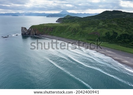 Khalaktyrsky beach and rocky Cape Vertical on Kamchatka peninsula. Russia, Pacific ocean