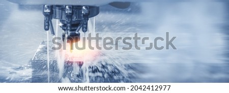 Auto CNC turning with robot drill milling factory with water coolant streams. Concept banner metal machine industry background. Royalty-Free Stock Photo #2042412977