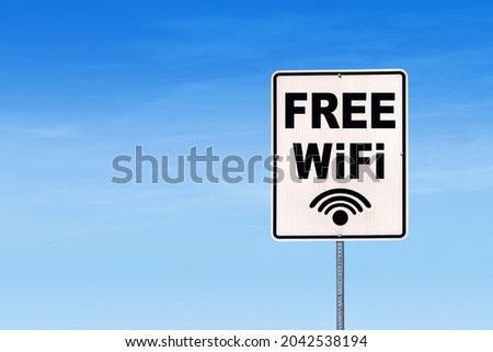 Free WiFi street sign with blue background