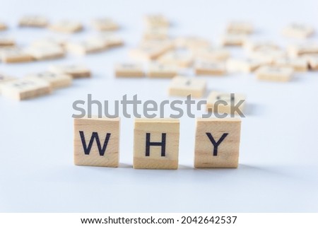 WHY cube blocks on white background. Wooden blocks with the word WHY. Why? wood cube - Business Concept