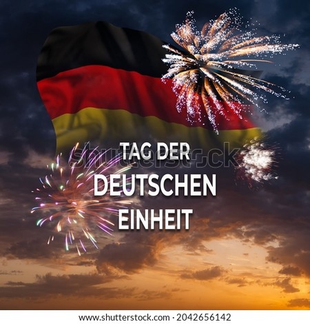Germany Unity day holiday background with flag and fireworks. Text on German - Day of German unity Royalty-Free Stock Photo #2042656142