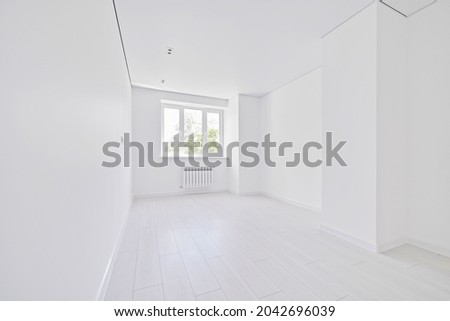 Modern light white empty living room with window. No people