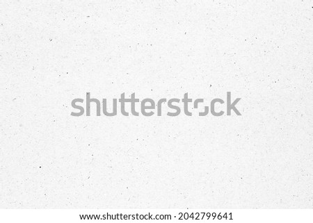White paper or cardboard texture with black spot background. Royalty-Free Stock Photo #2042799641