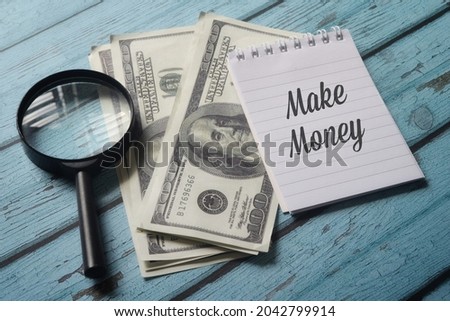Top view of money with Make Money wording. Business concept