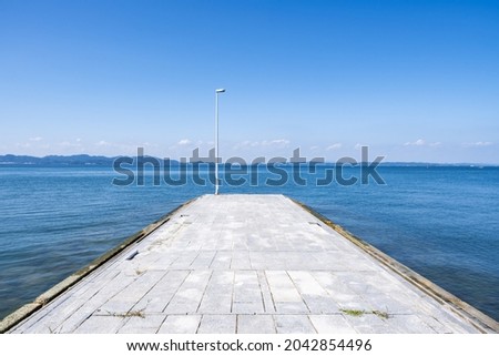 Landscape of Blue Sea or Ocean and Sky in Summer, Seto Inland Sea in Teshima Island in Kagawa Prefecture in Japan, Travel or Vacation Background Royalty-Free Stock Photo #2042854496