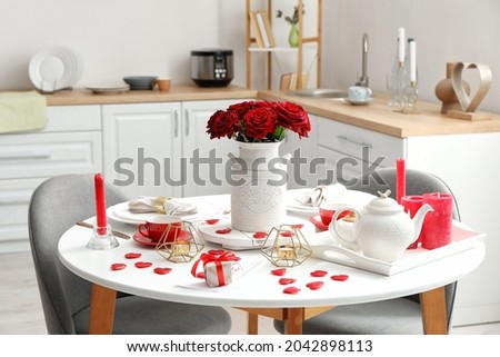 Festive table setting for Valentines Day celebration at home Royalty-Free Stock Photo #2042898113