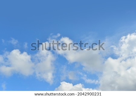 Blue Sky and white cloud for background texture. The morning beautiful clear cloudy in sunlight spring season. vivid cyan cloudscape in nature and very good environment. soft and grain effect.