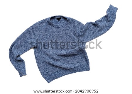 Blue sweater isolated on white, casual vintage knitted sweater, wool cardigan, top view Royalty-Free Stock Photo #2042908952