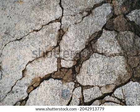 Photo of cracked concrete,looks unique.
