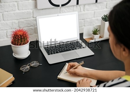 Girl studying at home. Concept of online education